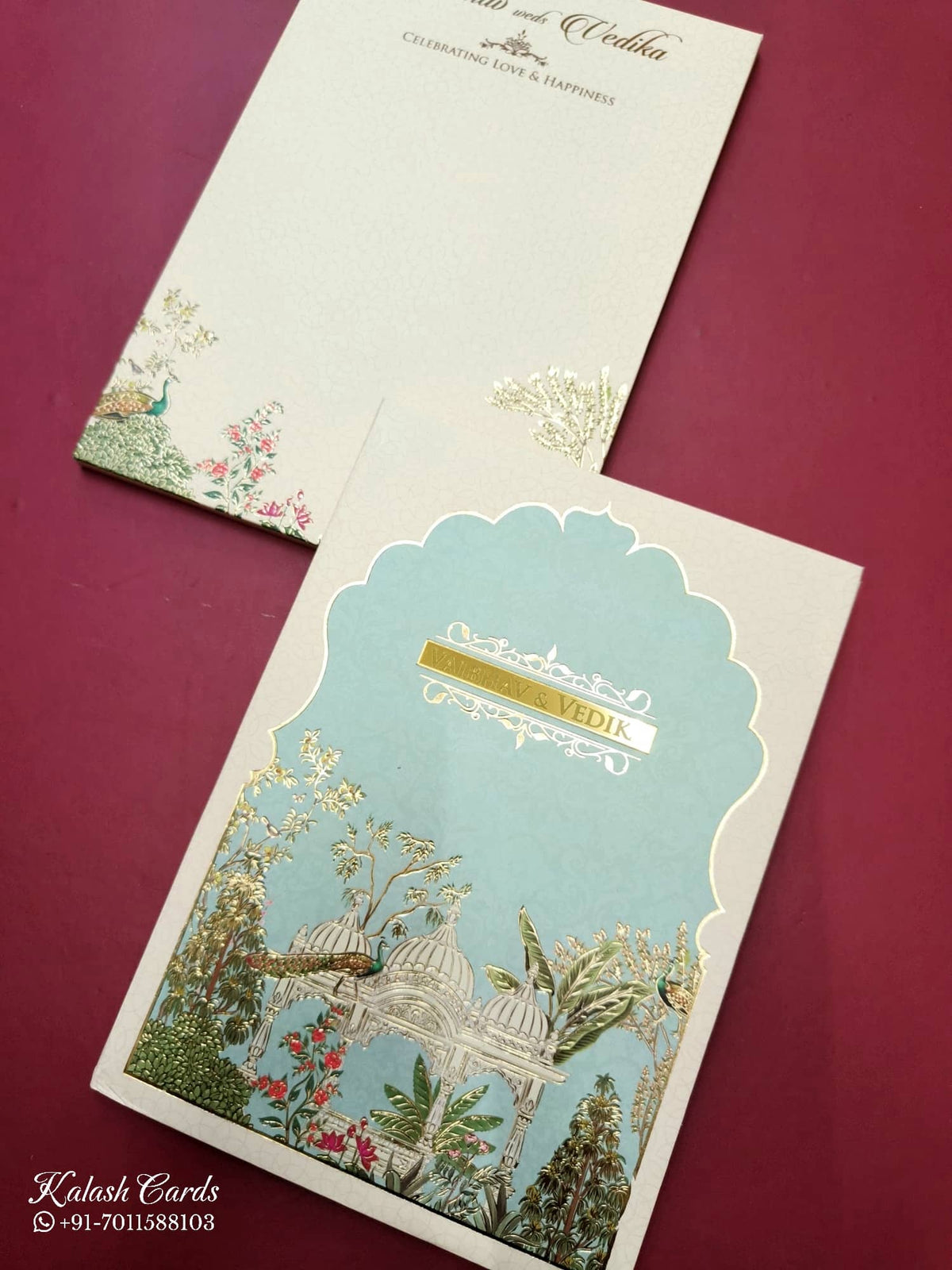 KLB817 Royal Fort Peacock Design Creme Blue Color Hardboard Padding Thick Wedding Card (2 Page & Couple Name Acrylic)