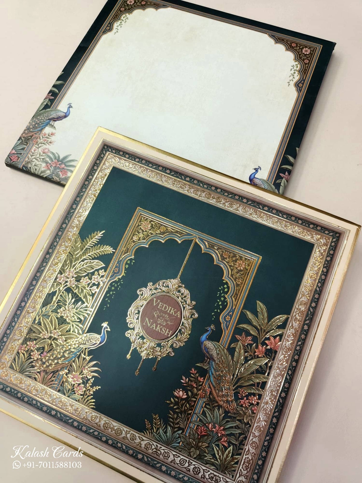 KLB886 Peacock Design Blue Green Color Premium 3D Gold Foil Hardboard Padding Thick Wedding Card (2 Page & Couple Name Wooden Plate)-Kalash Cards