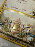 KLB934 Creme Yellow Royal Fort Peacock Laser Cut Padded Thick Wedding Card (2 Page & Couple Name Acrylic)-Kalash Cards
