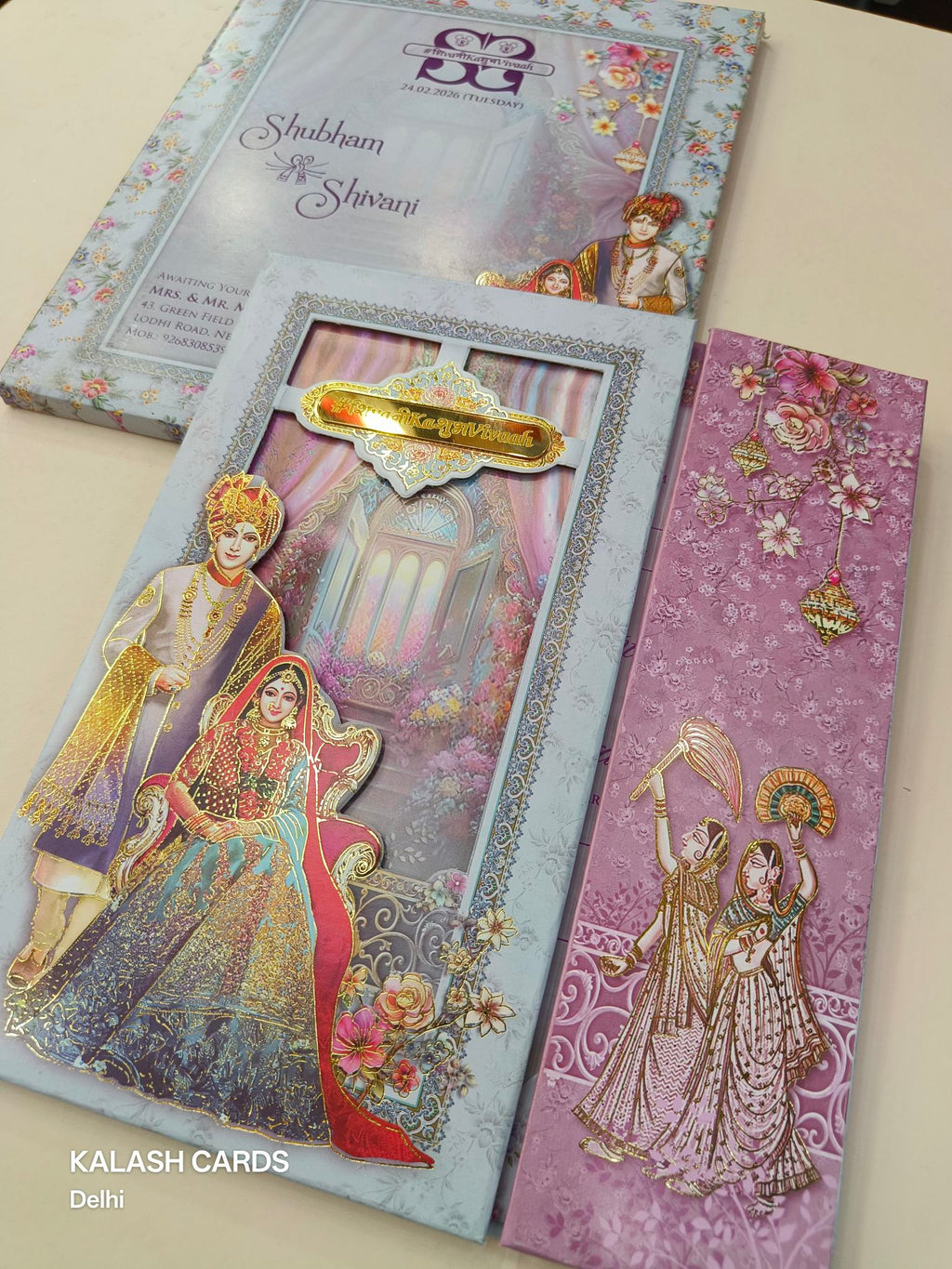 KLB617 Royal Theme Raja Rani Design Padding Hardboard Thick Wedding Card (2 Page & Couple Name Acrylic Mirror)-Kalash Cards