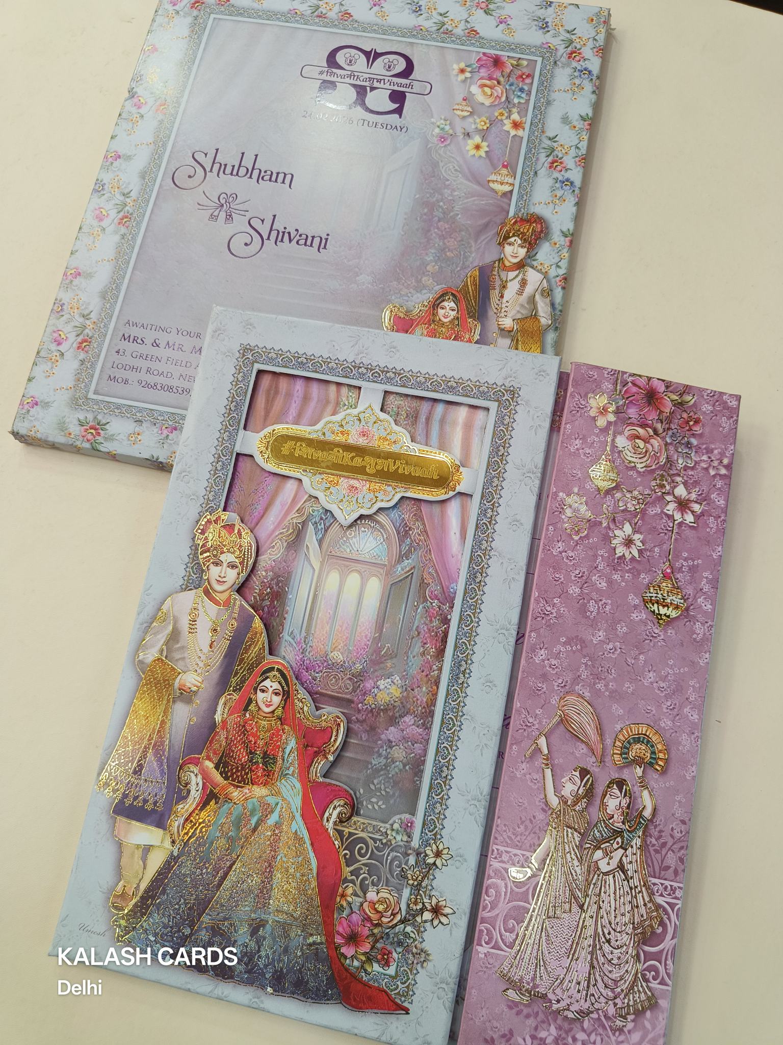 KLB617 Royal Theme Raja Rani Design Padding Hardboard Thick Wedding Card (2 Page & Couple Name Acrylic Mirror)-Kalash Cards