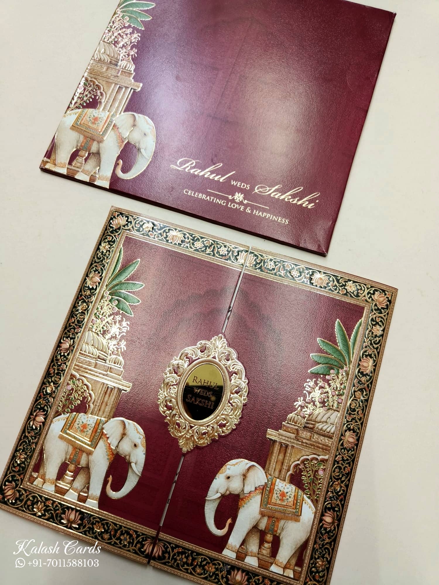 KLB738 Elephant Design Maroon Color Double Door Style Semi Box Wedding Card (2 Page & Couple Name Acrylic)