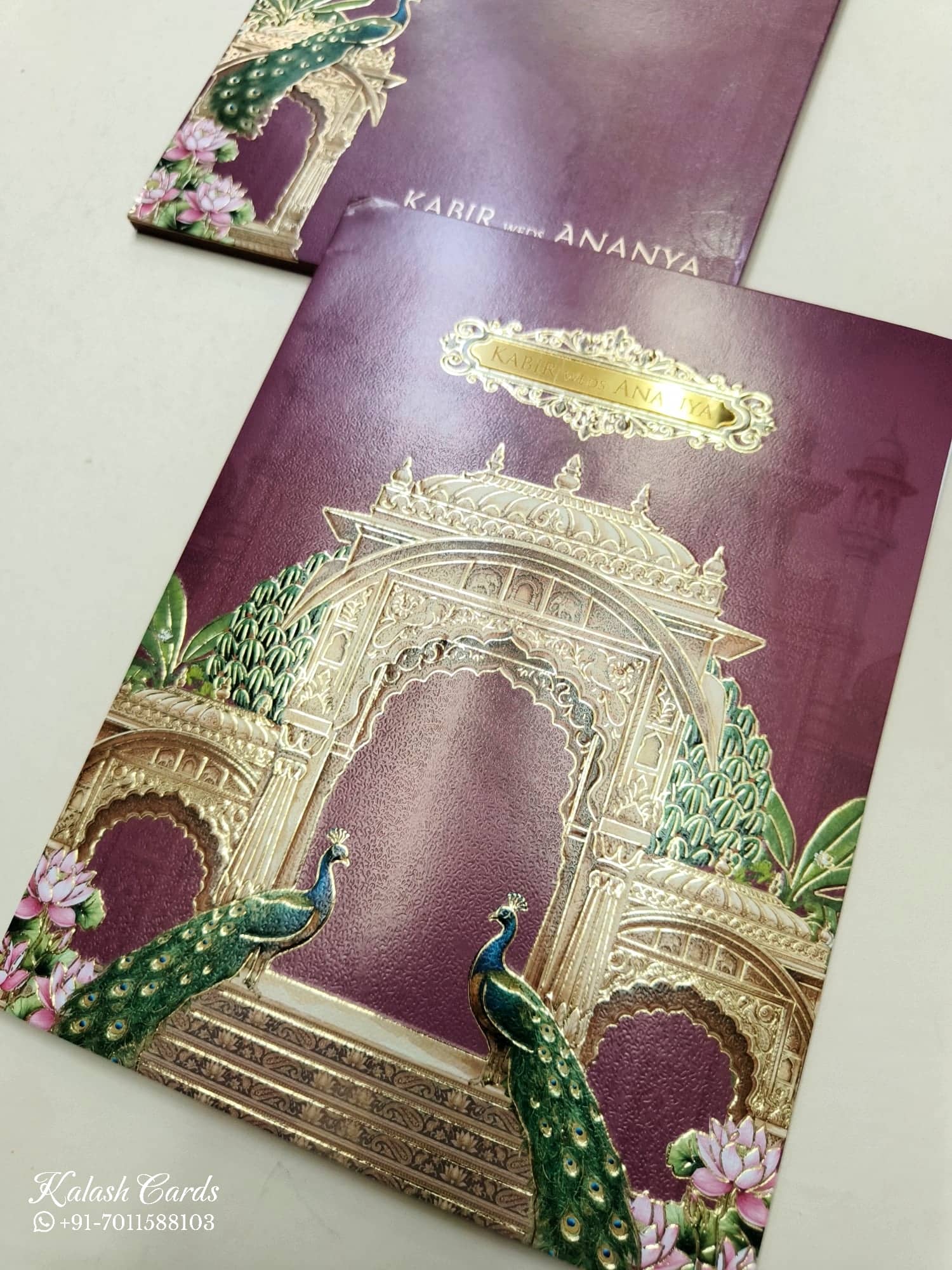KLB772 Mandap Peacock Design Maroon Color Embossed Semi Box Wedding Card (2 Page & Couple Name Acrylic)