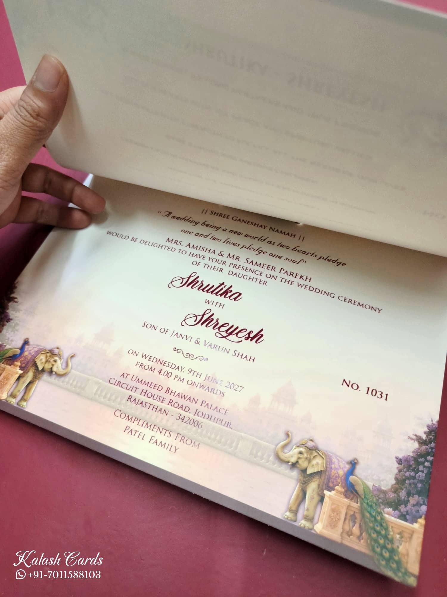 KLB796 Raja Rani Royal Fort Peacock Elephant Design Creme Red Color Semi Box Wedding Card (2 Page & Couple Name Acrylic)