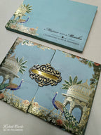 KLB825 Royal Fort Peacock Design Blue Color Double Door Style Hardboard Padding Thick Wedding Card (2 Page & Couple Name Acrylic)