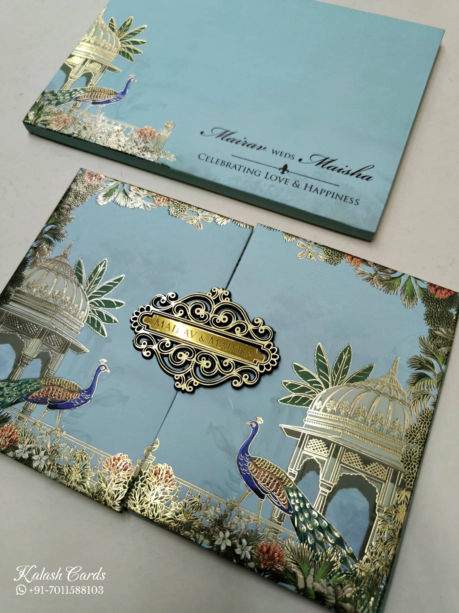 KLB825 Royal Fort Peacock Design Blue Color Double Door Style Hardboard Padding Thick Wedding Card (2 Page & Couple Name Acrylic)