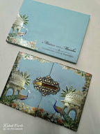 KLB825 Royal Fort Peacock Design Blue Color Double Door Style Hardboard Padding Thick Wedding Card (2 Page & Couple Name Acrylic)