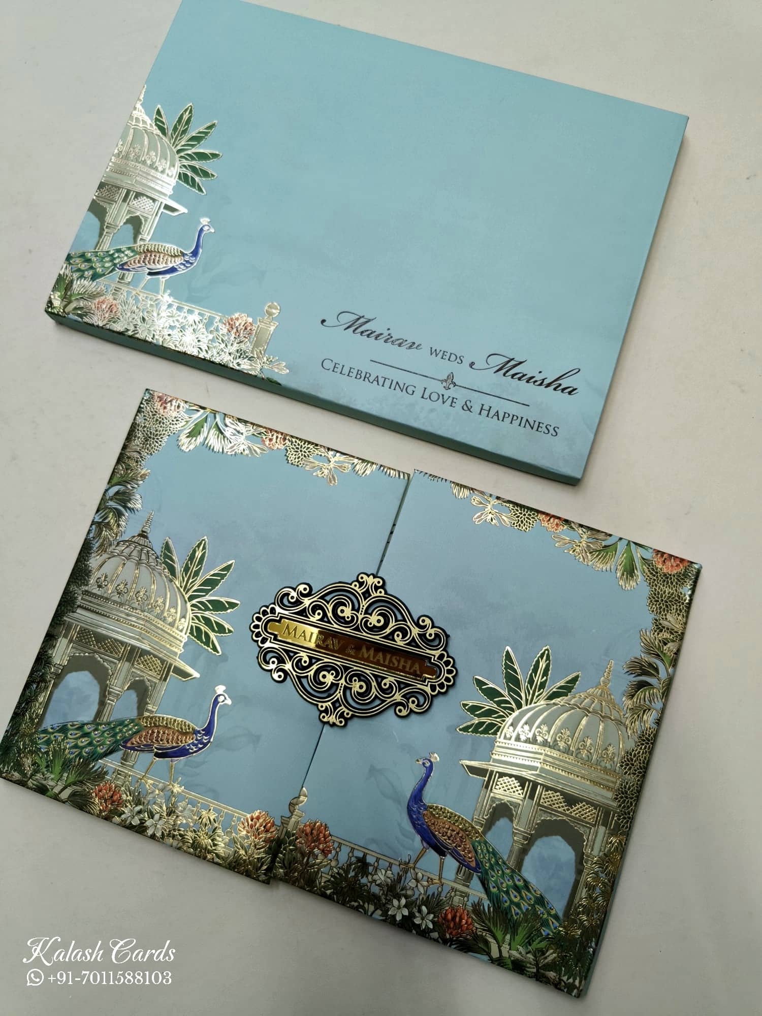 KLB825 Royal Fort Peacock Design Blue Color Double Door Style Hardboard Padding Thick Wedding Card (2 Page & Couple Name Acrylic)