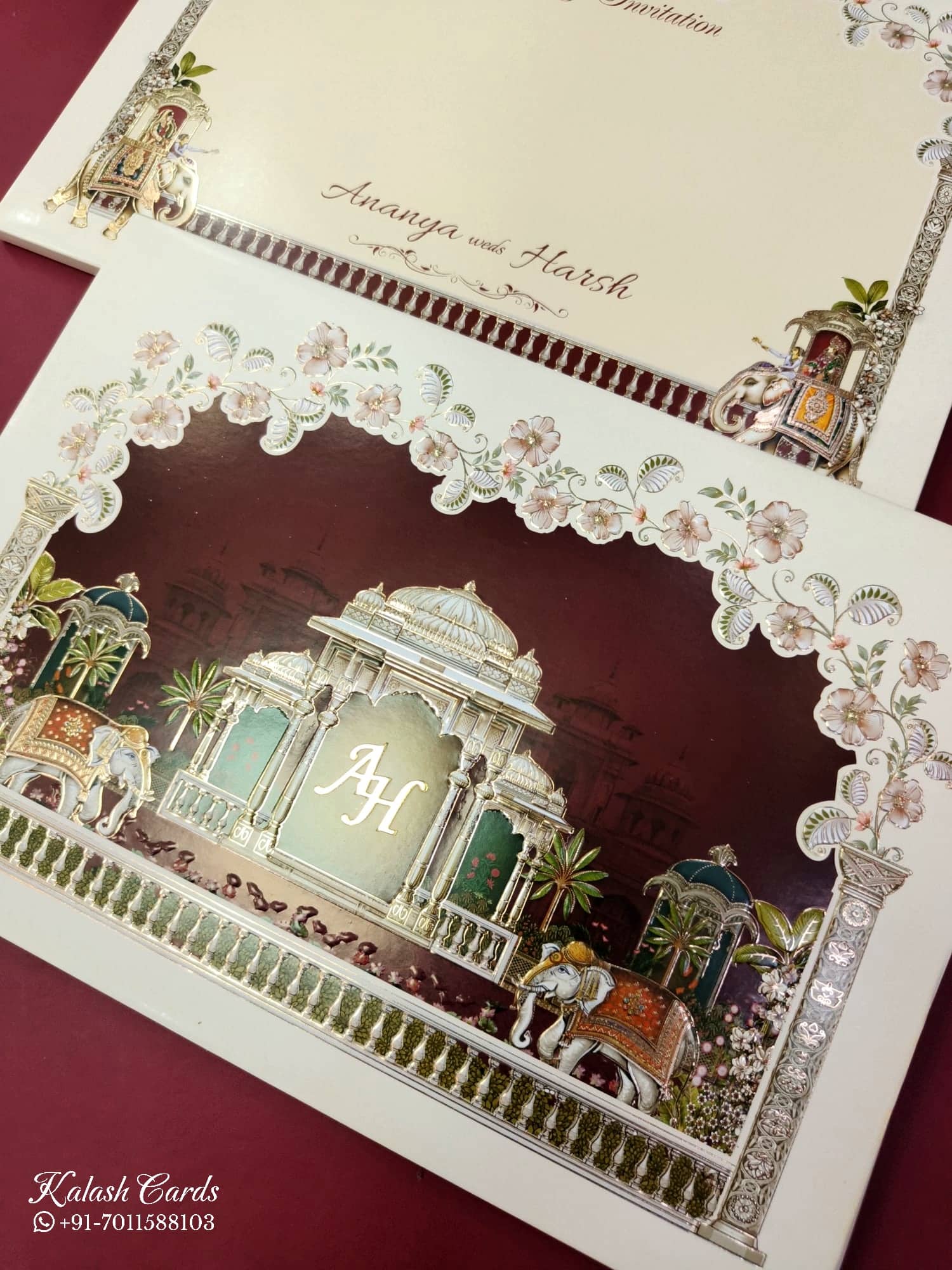 KLB846 Royal Fort Elephant Design Creme Maroon Color Embossed Hardboard Padding Thick Wedding Card (2 Page & Couple Initial Acrylic)
