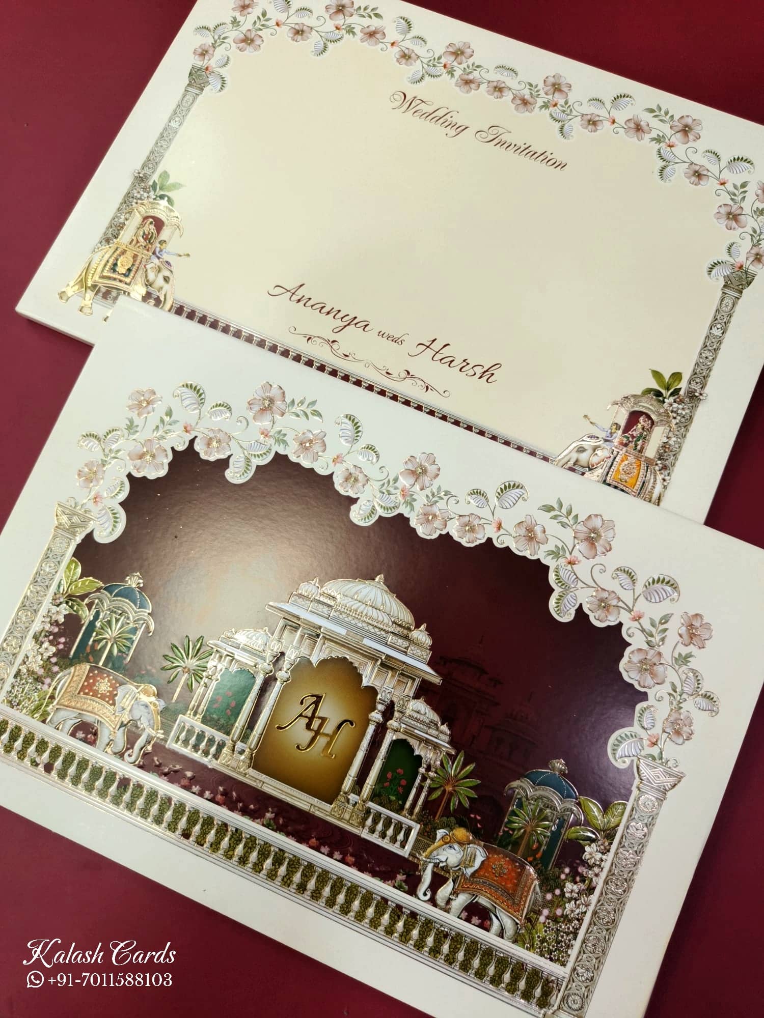 KLB846 Royal Fort Elephant Design Creme Maroon Color Embossed Hardboard Padding Thick Wedding Card (2 Page & Couple Initial Acrylic)