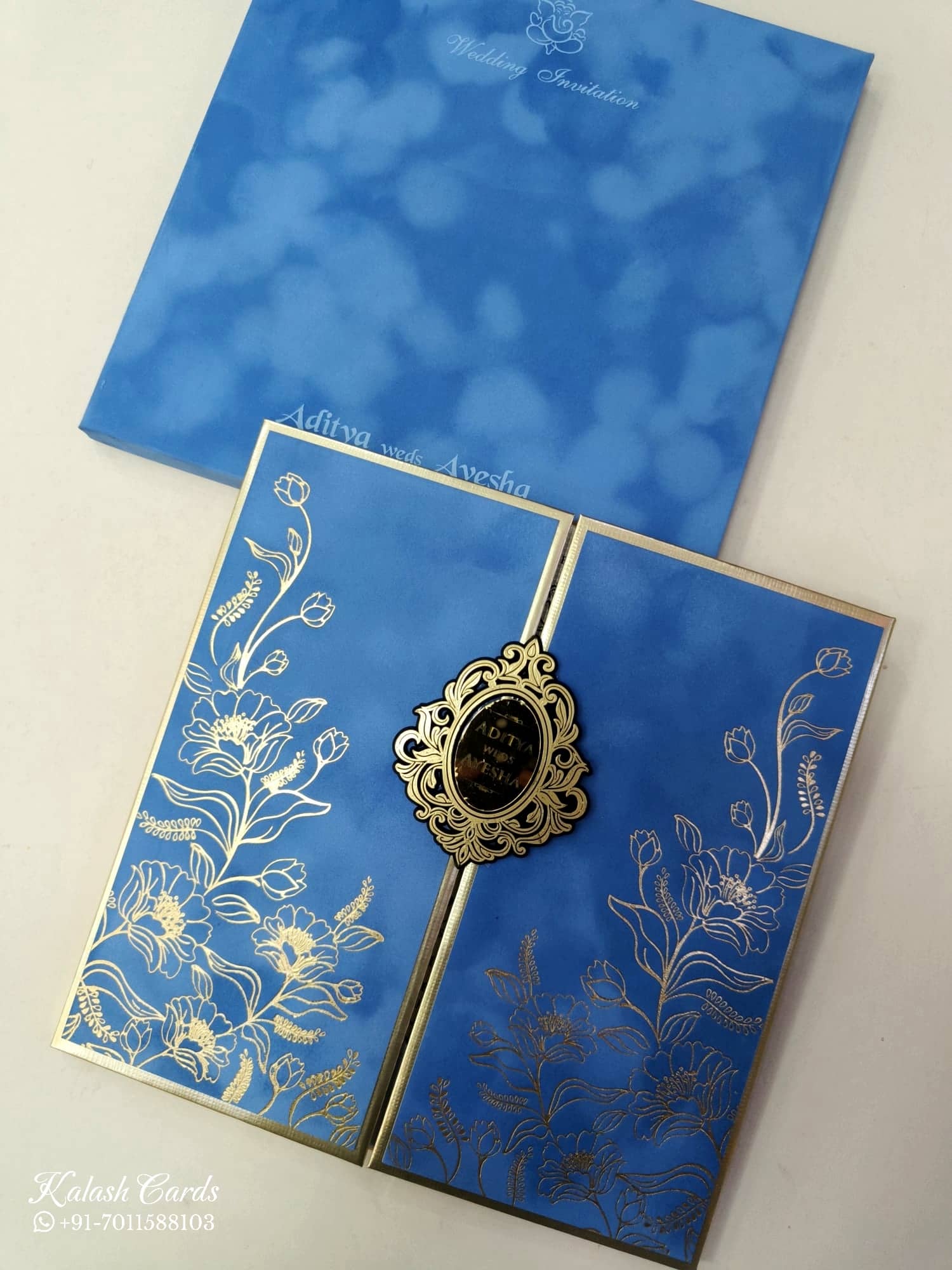 KLB860 Floral Design Blue Color Velvet Double Door Style Hardboard Padding Thick Wedding Card (2 Page & Couple Name Acrylic)