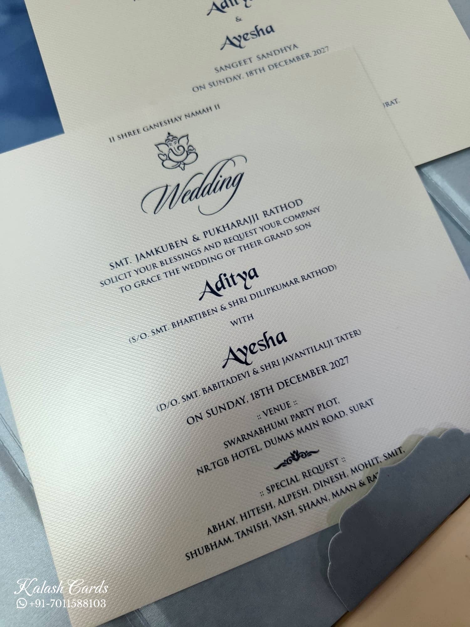 KLB860 Floral Design Blue Color Velvet Double Door Style Hardboard Padding Thick Wedding Card (2 Page & Couple Name Acrylic)