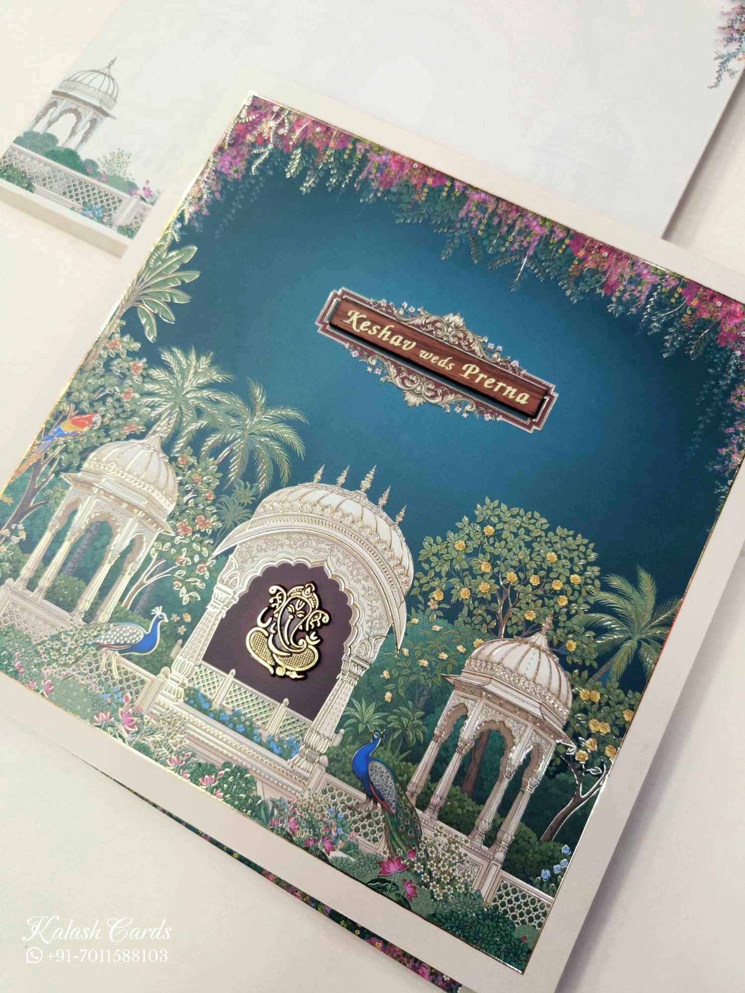 KLB877 Royal Fort Peacock Design Royal Blue Color Premium 3D Gold Foil Semi Box Wedding Card (2 Page & Couple Name Wooden Plate)