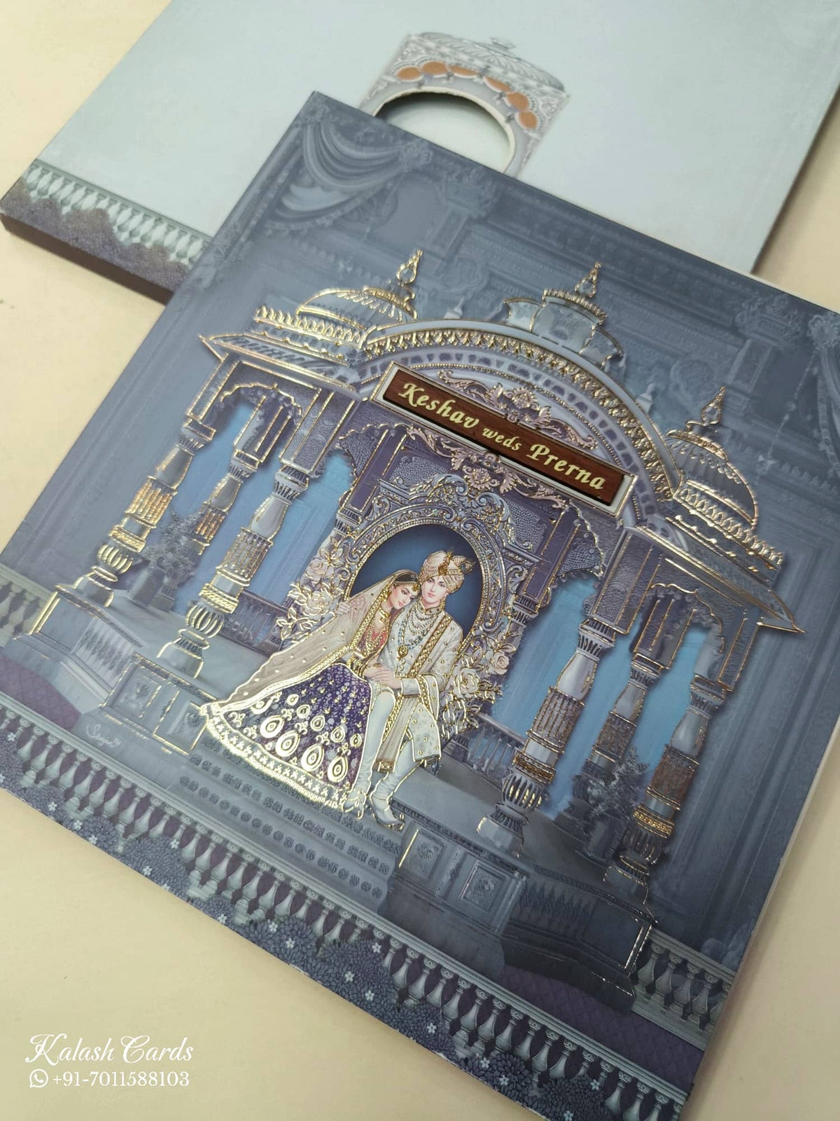 KLB878 Dulha Dulhan Mandap Design Blue Color Premium 3D Gold Foil Semi Box Wedding Card (2 Page & Couple Name Wooden Plate)