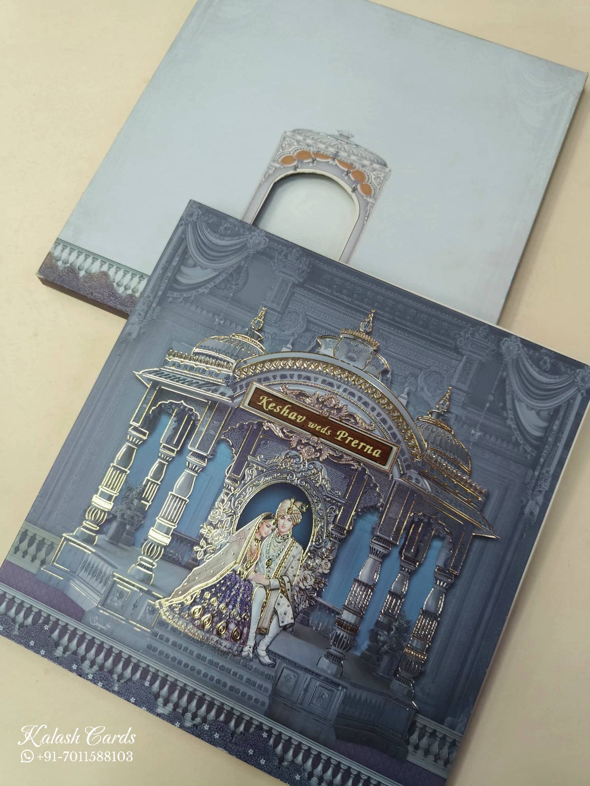 KLB878 Dulha Dulhan Mandap Design Blue Color Premium 3D Gold Foil Semi Box Wedding Card (2 Page & Couple Name Wooden Plate)