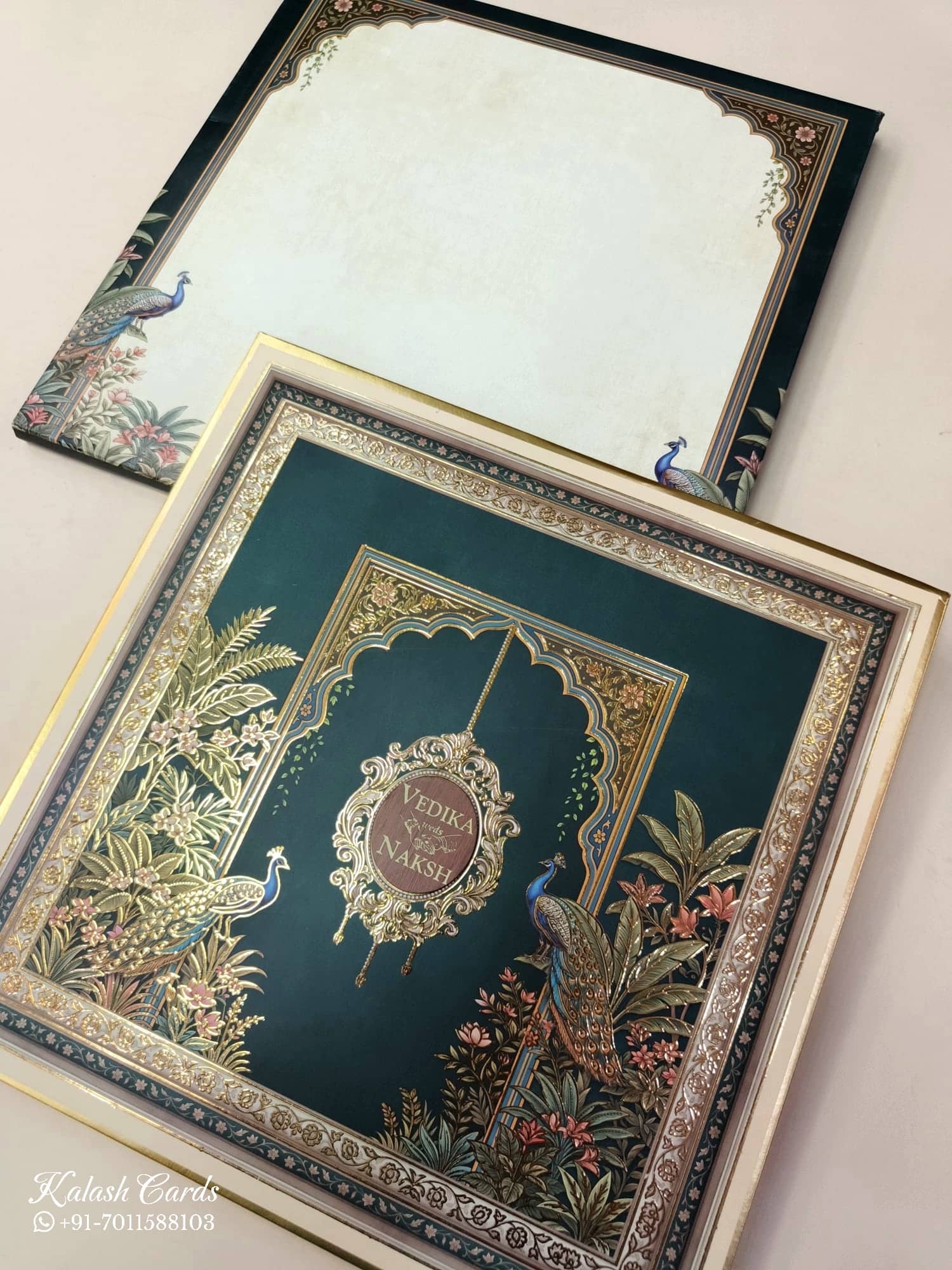 KLB886 Peacock Design Blue Green Color Premium 3D Gold Foil Hardboard Padding Thick Wedding Card (2 Page & Couple Name Wooden Plate)