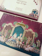 KLB903 Raja Rani Design Maroon Color Premium 3D Gold Foil Hardboard Padding Thick Wedding Card (2 Page & Couple Name Acrylic)