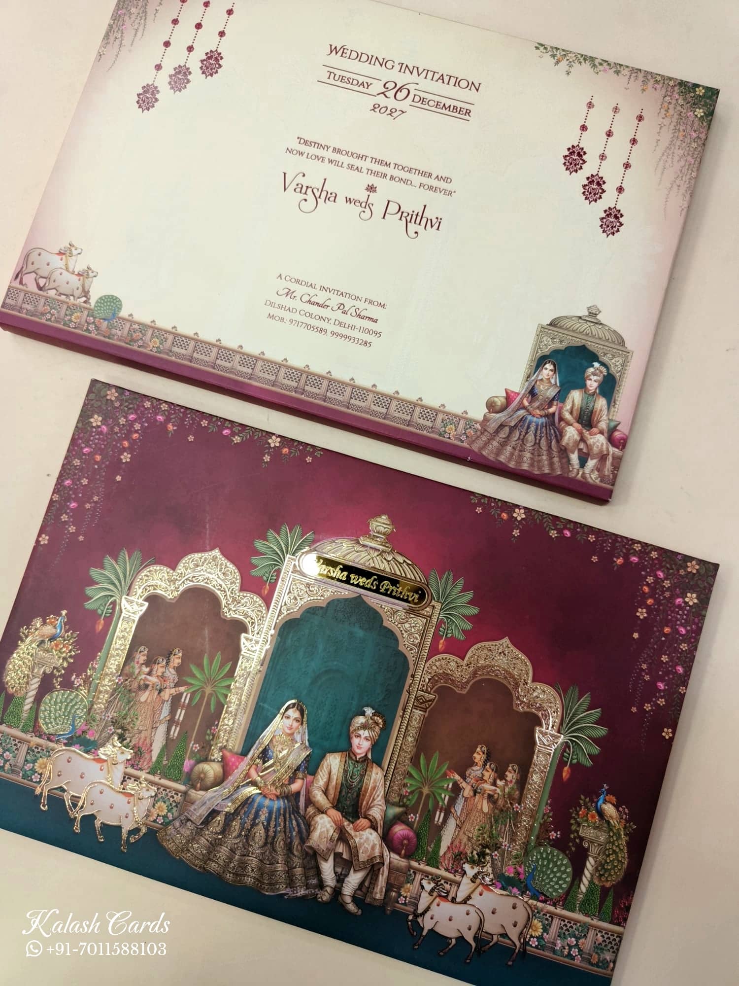 KLB903 Raja Rani Design Maroon Color Premium 3D Gold Foil Hardboard Padding Thick Wedding Card (2 Page & Couple Name Acrylic)