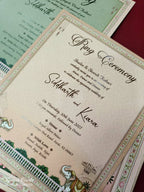 KLB918 Peach Pichwai Radha Krishna Padded Thick Wedding Card (2 Page & Couple Name Acrylic)
