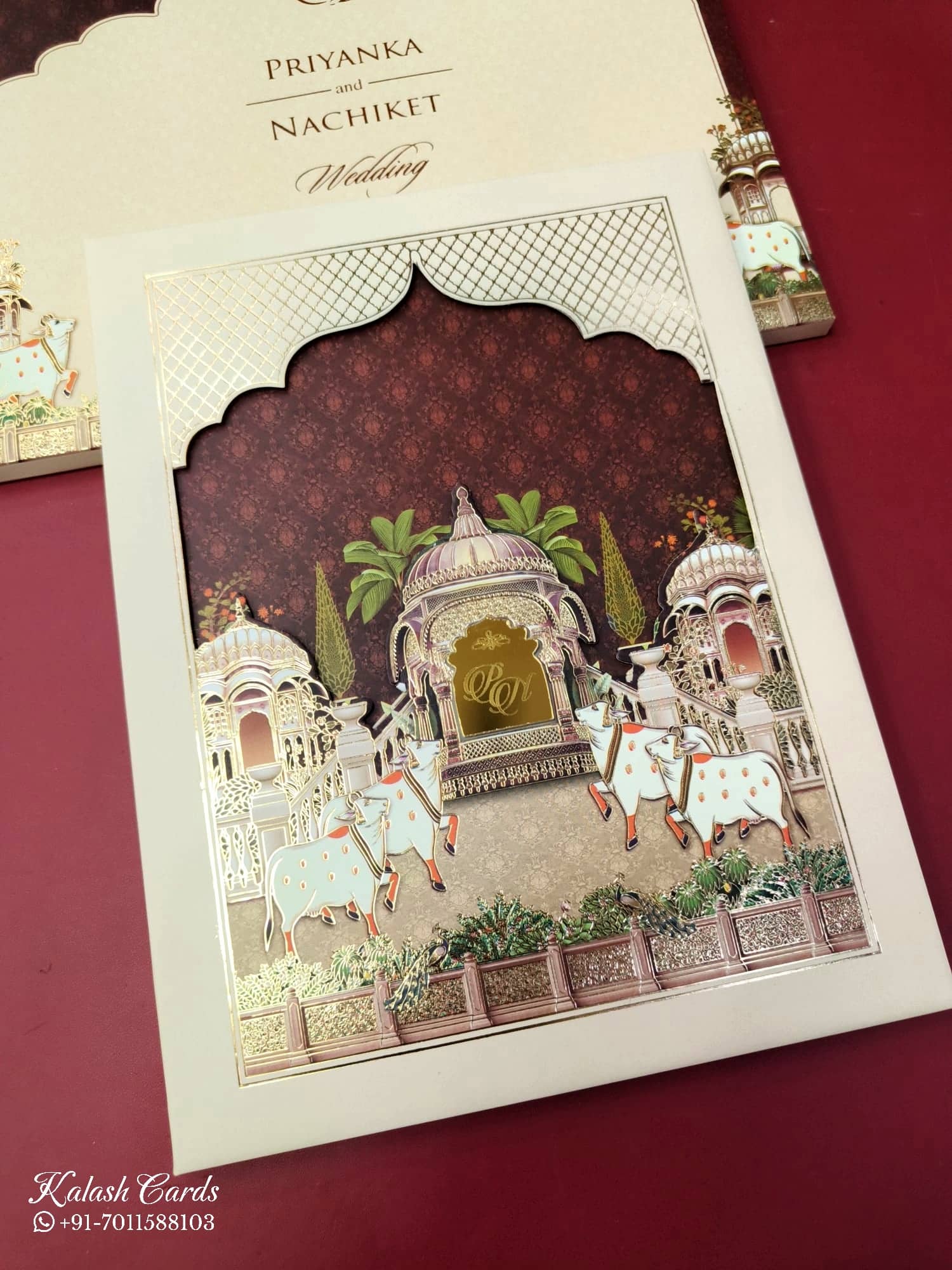 KLB927 Creme Maroon Royal Fort Pichwai Laser Cut Padded Thick Wedding Card (2 Page & Couple Initial Acrylic)
