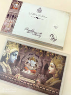 KLB944 Brown Radha Krishna Ganesh Ji Padded Thick Wedding Card (2 Page & Couple Name Wooden Plate)