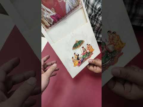 KLB871 Raja Rani Design Creme Maroon Color Double Door Style Semi Box Wedding Card (2 Page & Couple Name Wooden Plate)