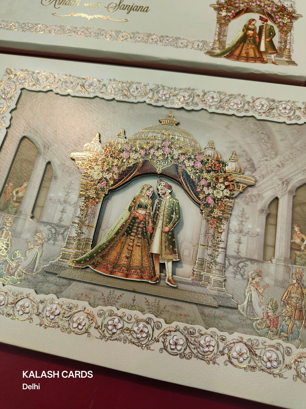 KLB529 Pastel Green Raja Rani Theme Laser Cut Work Hardboard Padding Thick Wedding Card (2 Thick Page)-Kalash Cards