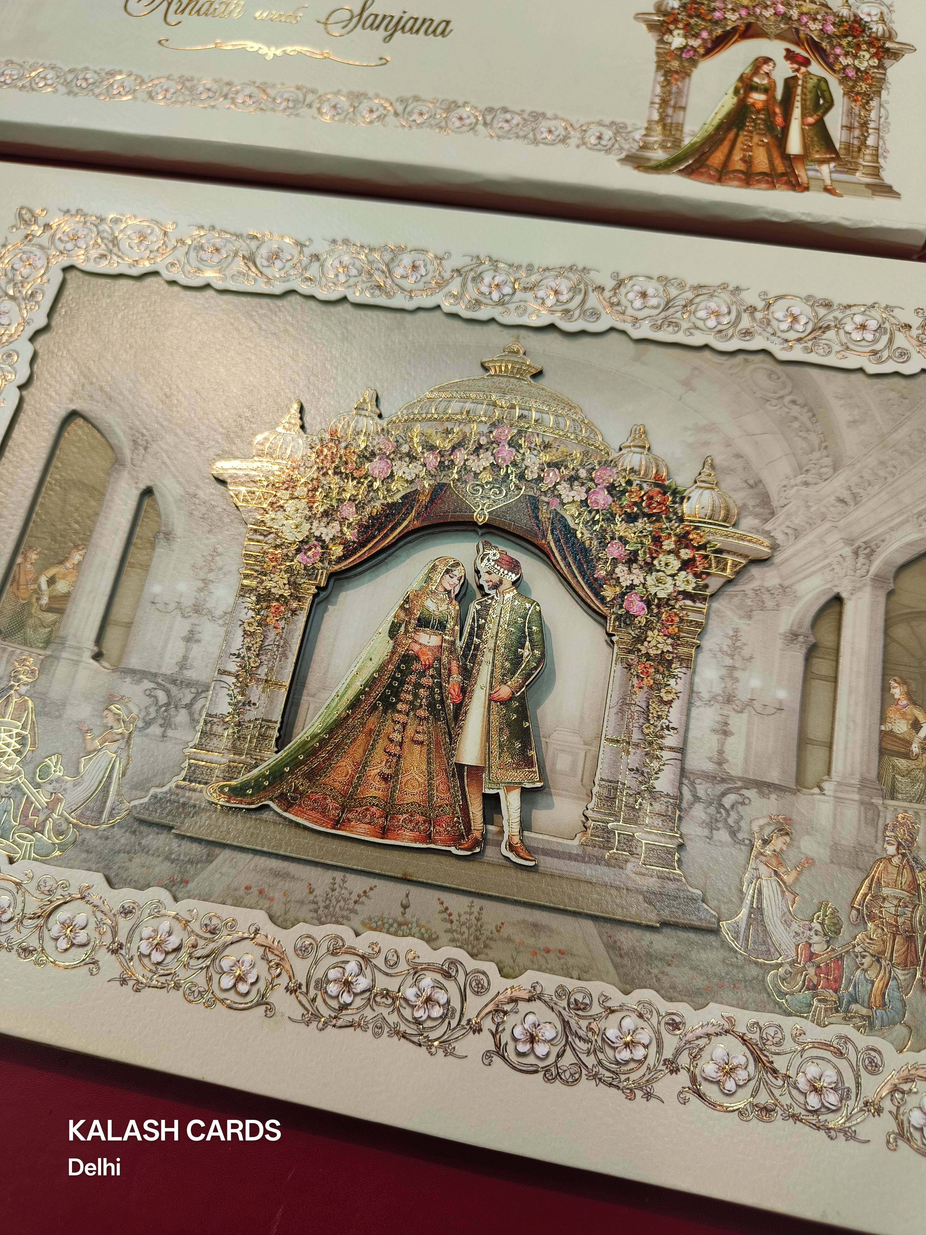 KLB529 Pastel Green Raja Rani Theme Laser Cut Work Hardboard Padding Thick Wedding Card (2 Thick Page)-Kalash Cards