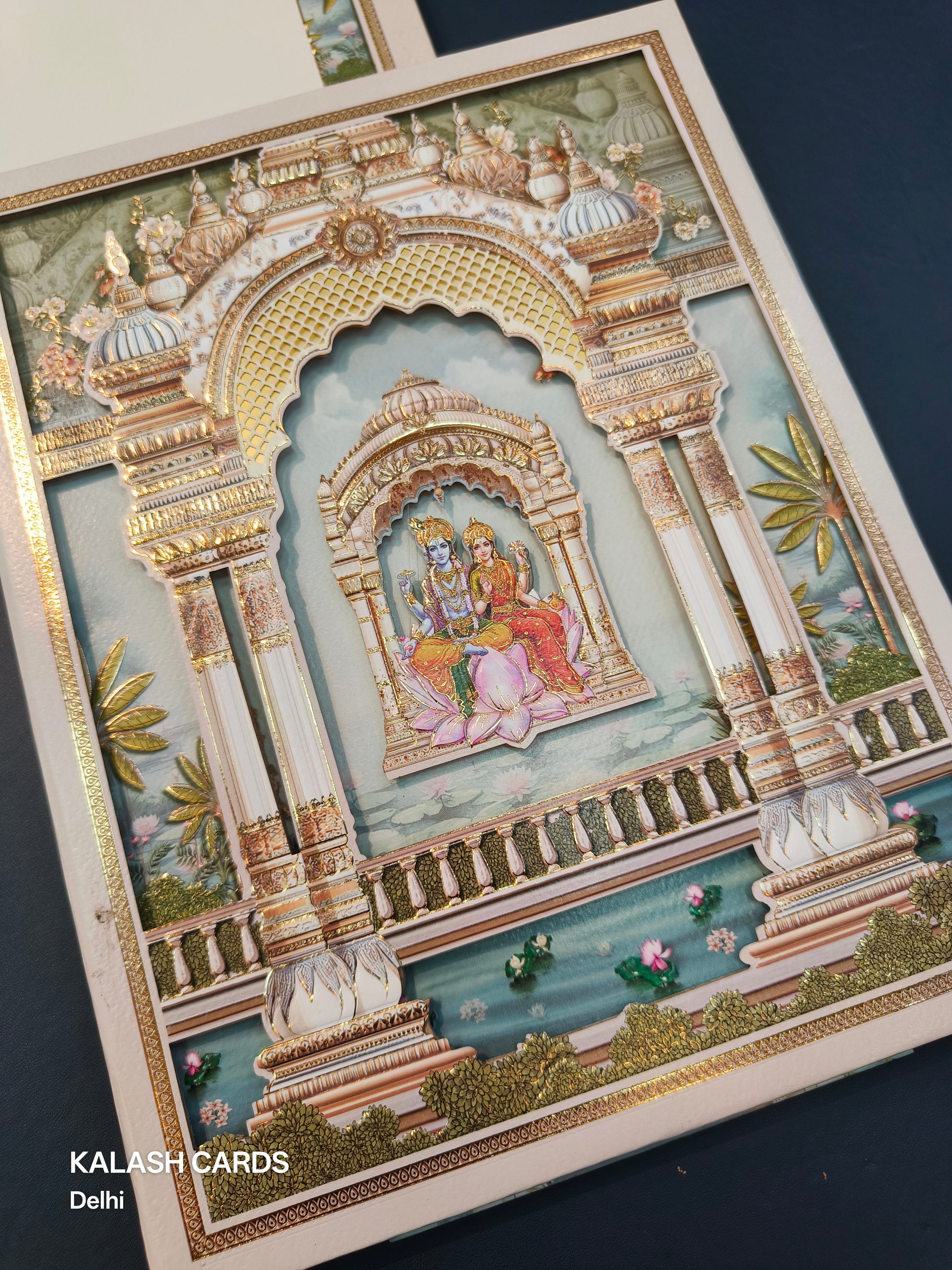 KLB507 Lord Vishnu Laxmi Theme Glitter Gold Laser Cut Work Hardboard Padding Thick Wedding Card (2 Thick Page)-Kalash Cards